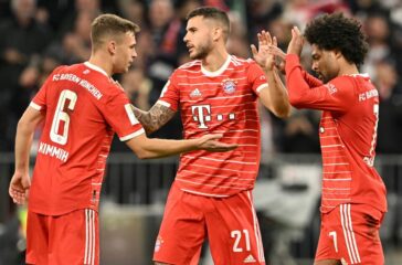 Bayern Munich's German midfielder Serge Gnabry (R) celebrates scoring his team's third goal 4:1 with Bayern Munich's German midfielder Joshua Kimmich (L) and Bayern Munich's French defender Lucas Hernandez during the German first division Bundesliga football match between Bayern Munich and Werder Bremen in Munich, southern Germany, on November 8, 2022. (Photo by CHRISTOF STACHE / AFP) / DFL REGULATIONS PROHIBIT ANY USE OF PHOTOGRAPHS AS IMAGE SEQUENCES AND/OR QUASI-VIDEO